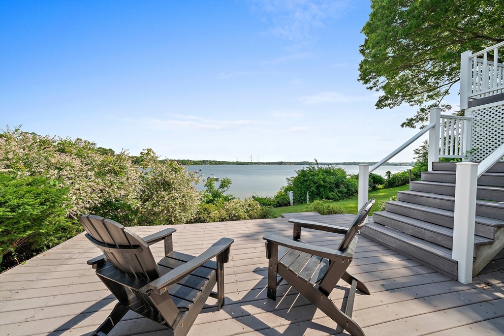 77 Jefferson Shores Road Wareham, MA 02532 - Photo 31 of 34 a view of a chairs and table on the terrace