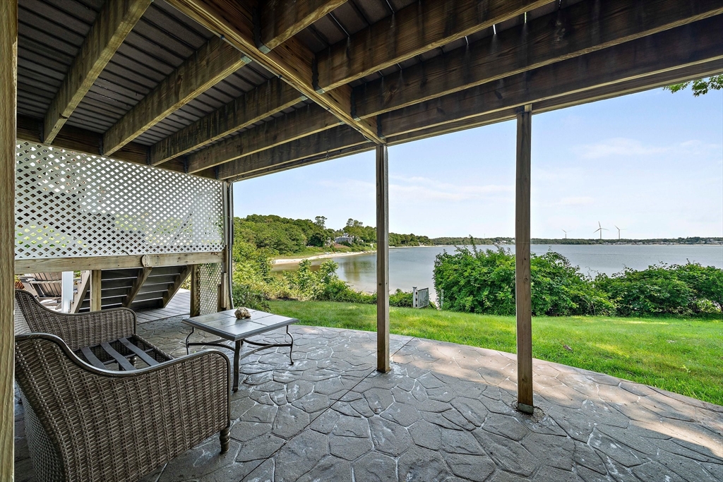 77 Jefferson Shores Road Wareham, MA 02532 - Photo 32 of 34 a view of a porch with furniture and garden