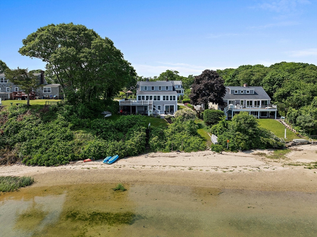 77 Jefferson Shores Road Wareham, MA 02532 - Photo 4 of 34 a view of a house with a backyard