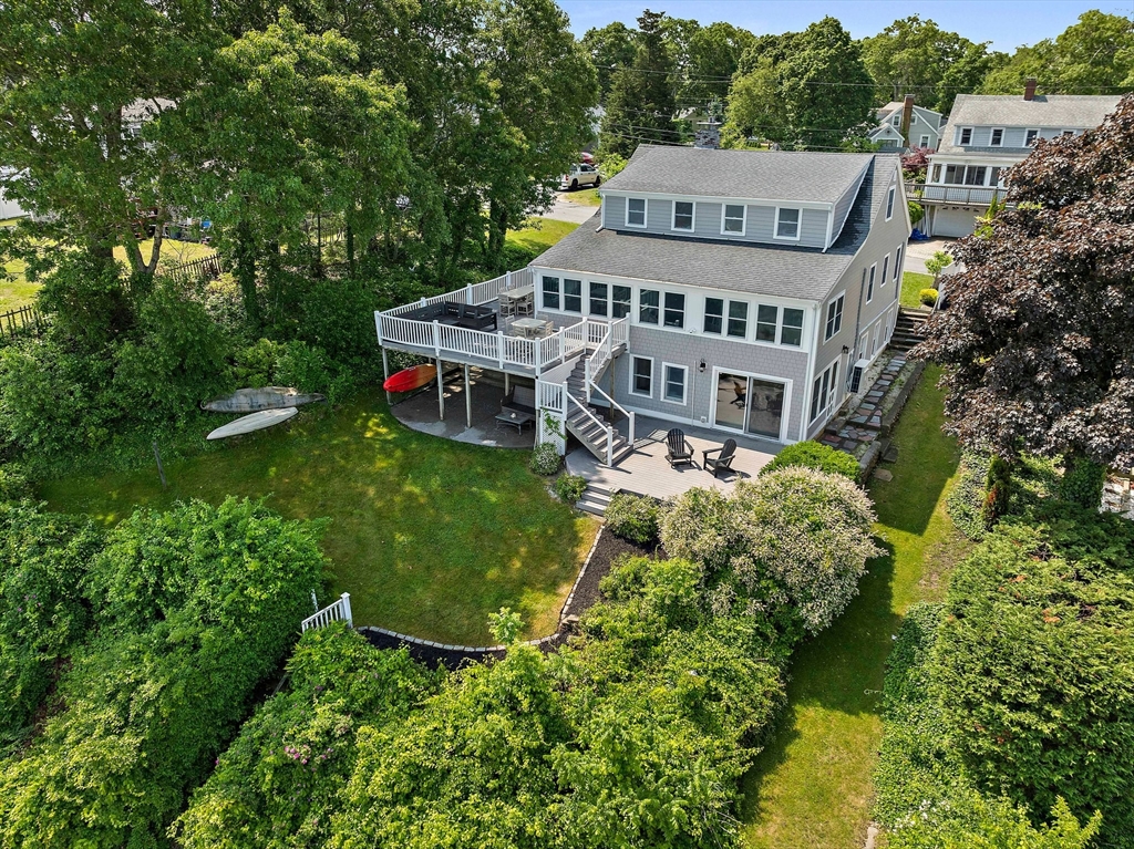 77 Jefferson Shores Road Wareham, MA 02532 - Photo 5 of 34 a view of a house with a yard