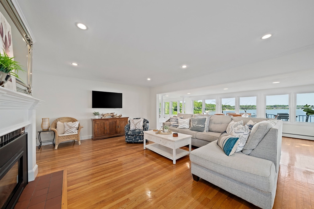 77 Jefferson Shores Road Wareham, MA 02532 - Photo 6 of 34 a living room with furniture and a flat screen tv