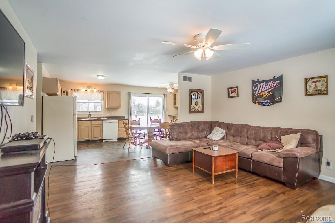 2890 Fleming Road Howell, MI 48855 - Photo 6 of 25 Living room is open to the kitchen
