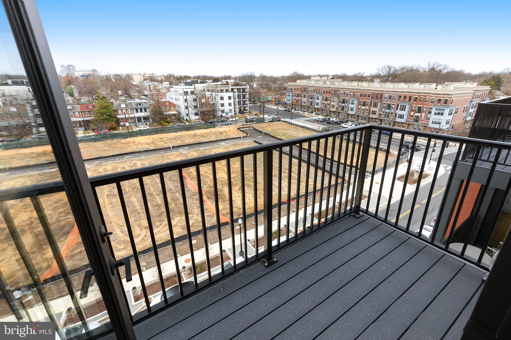 7175 12th Street Northwest, Unit 610 Washington, DC 20012 - Photo 21 of 35 a view of city from a balcony