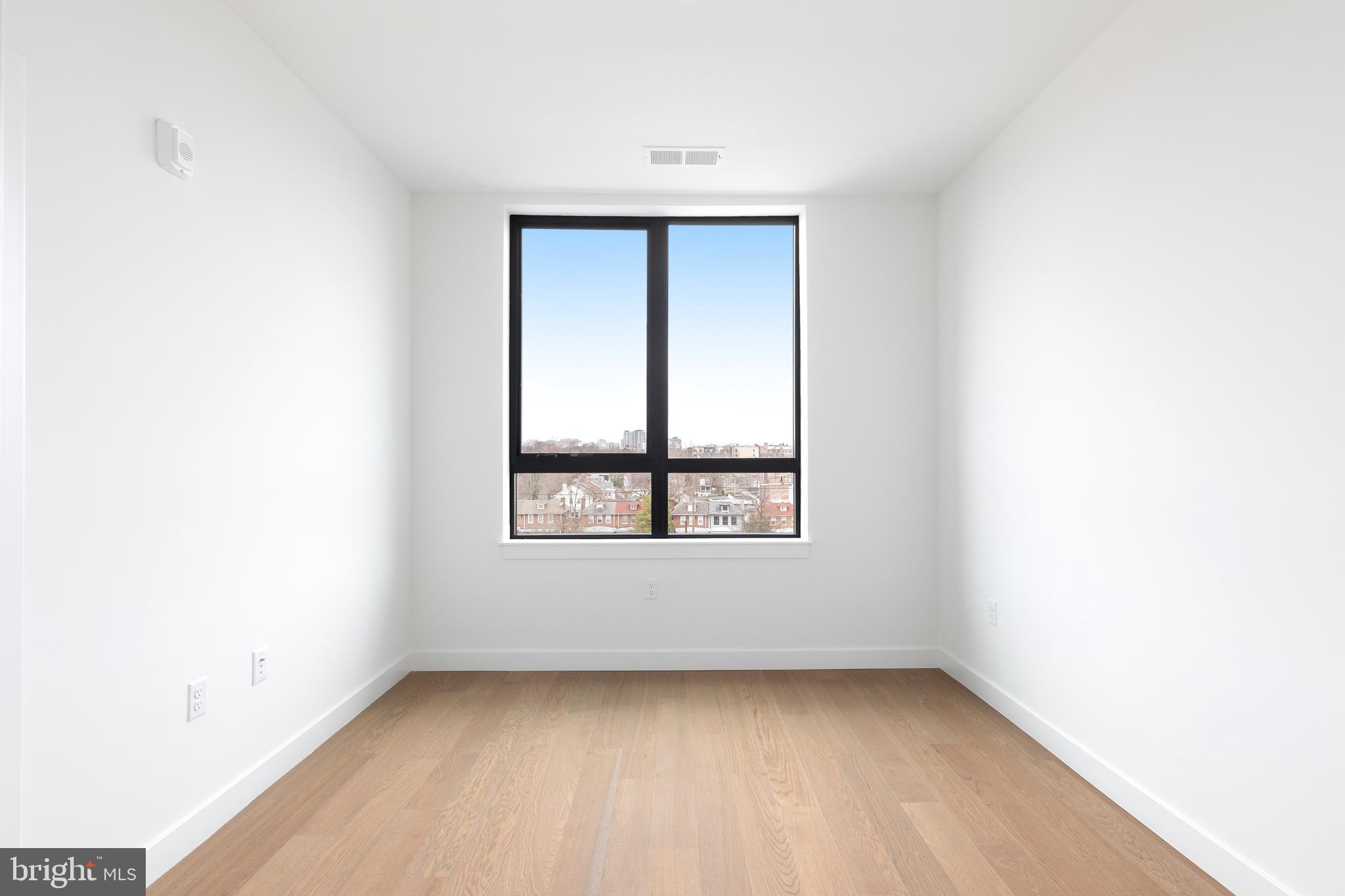 7175 12th Street Northwest, Unit 610 Washington, DC 20012 - Photo 4 of 35 a view of a room that has a window in it