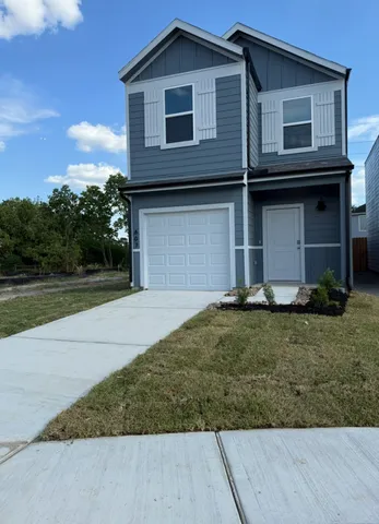 a house view with a garden space