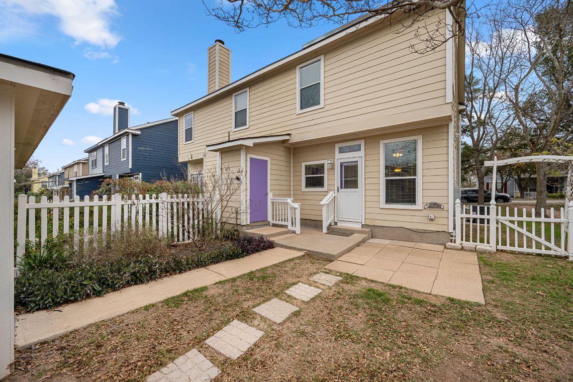 6095 Negley, Unit A Kyle, TX 78640 - Photo 29 of 40 a front view of a house with a yard