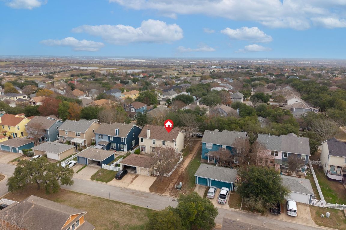 6095 Negley, Unit A Kyle, TX 78640 - Photo 32 of 40 an aerial view of a city with lots of residential buildings