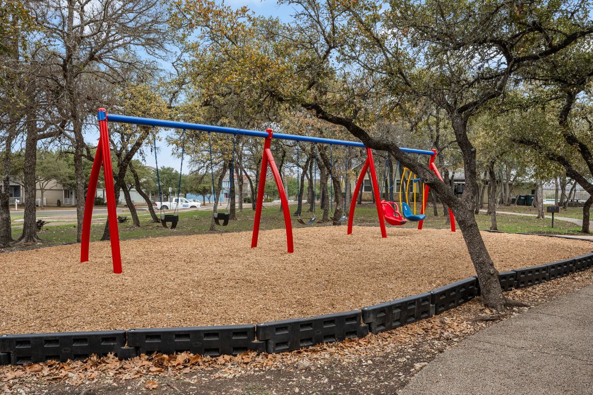 6095 Negley, Unit A Kyle, TX 78640 - Photo 34 of 40 a view of trees and sign board