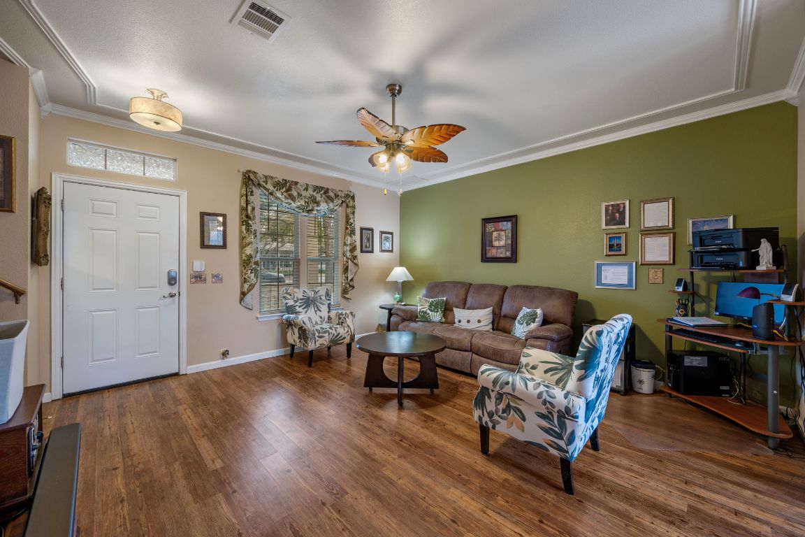 6095 Negley, Unit A Kyle, TX 78640 - Photo 4 of 40 a living room with furniture and a wooden floor