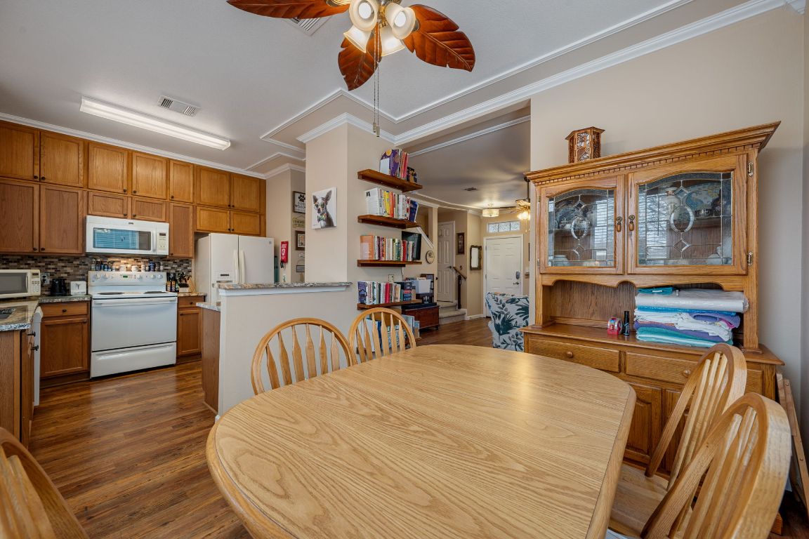 6095 Negley, Unit A Kyle, TX 78640 - Photo 8 of 40 a bedroom with furniture and a flat screen tv