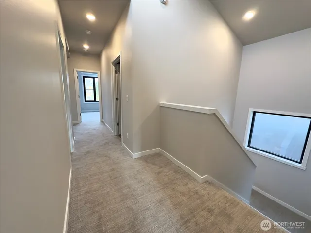 a view of hallway with stairs