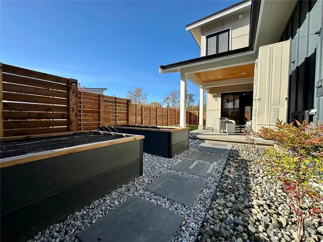 a front view of a house with a garage