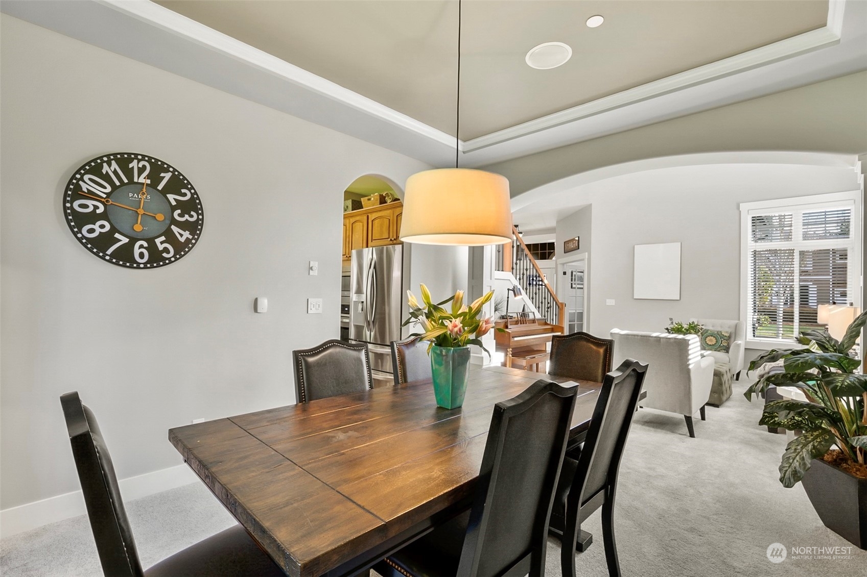21808 31st Drive Southeast Bothell, WA 98021 - Photo 11 of 39 a view of a dining room with furniture and chandelier