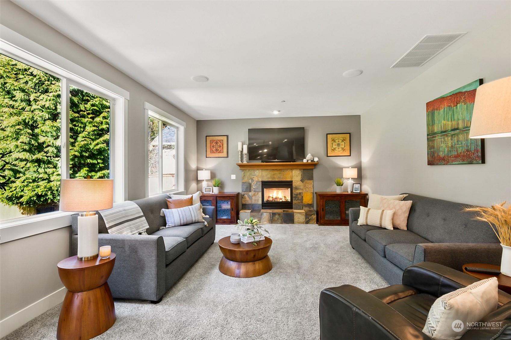 21808 31st Drive Southeast Bothell, WA 98021 - Photo 23 of 39 a living room with furniture fireplace and a large window