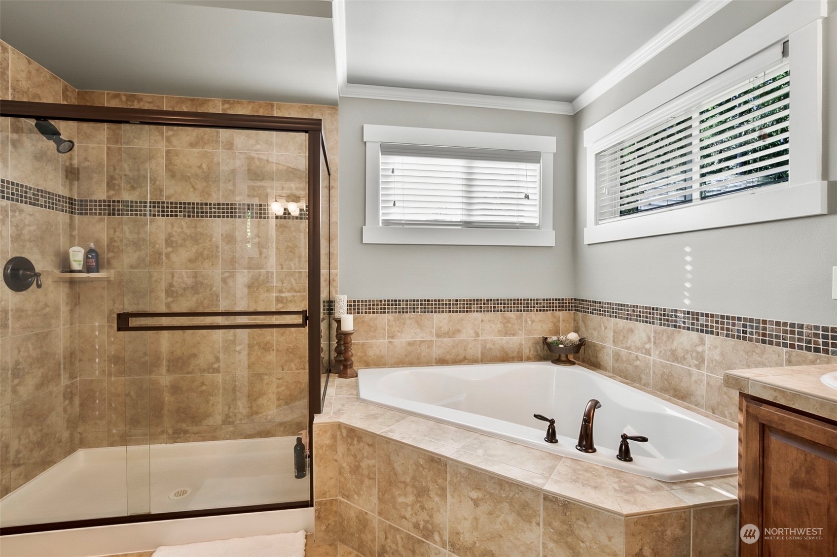 21808 31st Drive Southeast Bothell, WA 98021 - Photo 28 of 39 a bathroom with a bathtub and a shower