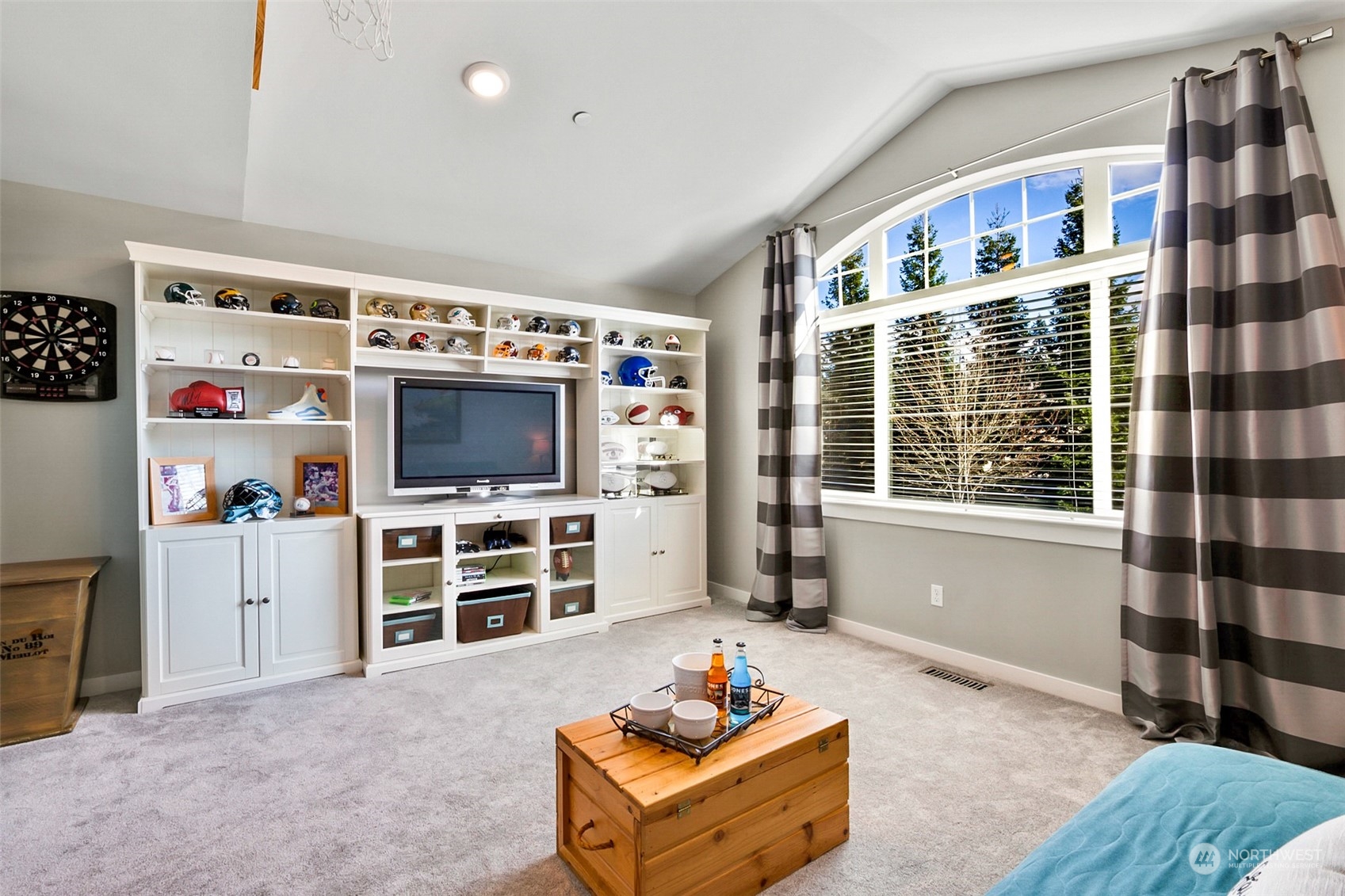 21808 31st Drive Southeast Bothell, WA 98021 - Photo 30 of 39 a living room with furniture and a flat screen tv