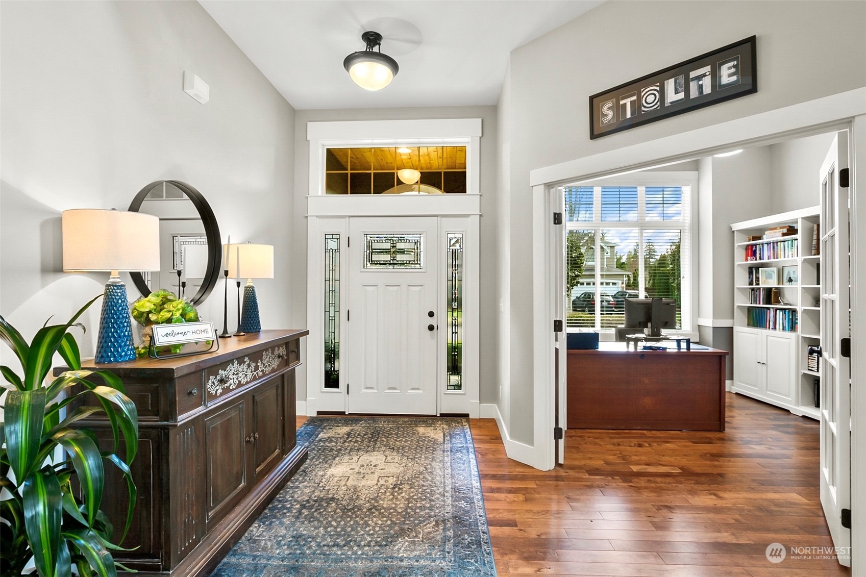 21808 31st Drive Southeast Bothell, WA 98021 - Photo 4 of 39 a kitchen with stainless steel appliances granite countertop a stove top oven a sink a counter space and cabinets