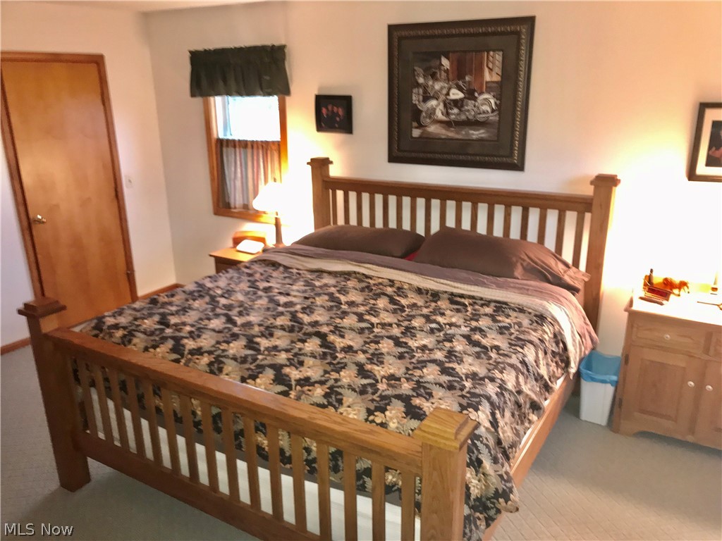 39610 Whitney Road Lagrange, OH 44050 - Photo 10 of 35 First floor master suite complete with whirlpool tub and a large walk-in closet.