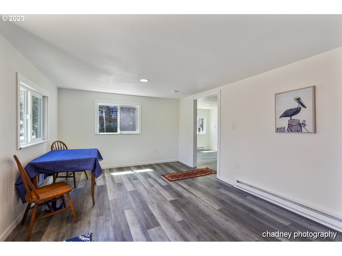 5707 Northwest Rhododendron Street Newport, OR 97365 - Photo 10 of 20 a view of a livingroom with furniture and a couch