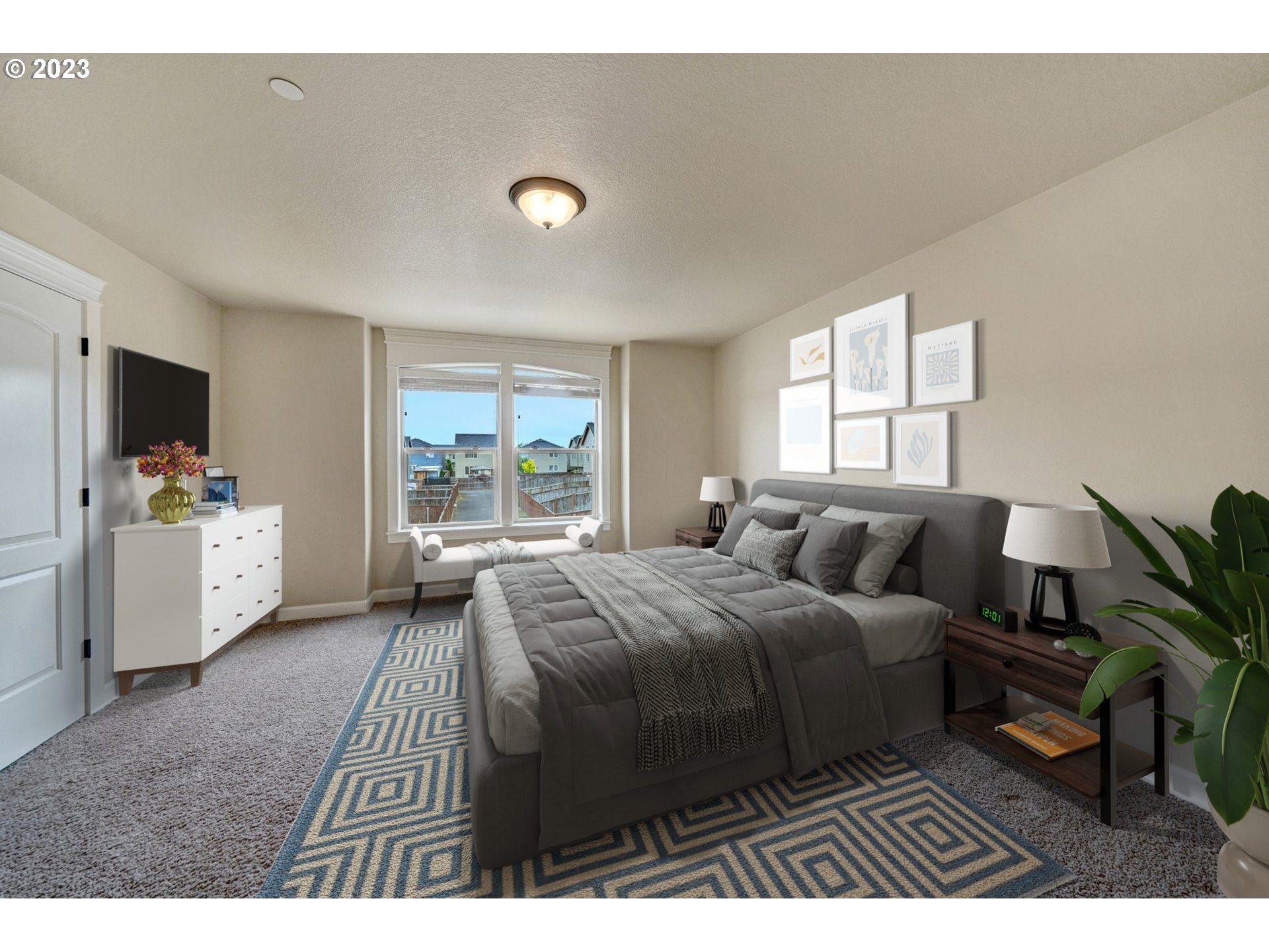 235 North 33rd Court Ridgefield, WA 98642 - Photo 13 of 30 a bedroom with a bed and a large window