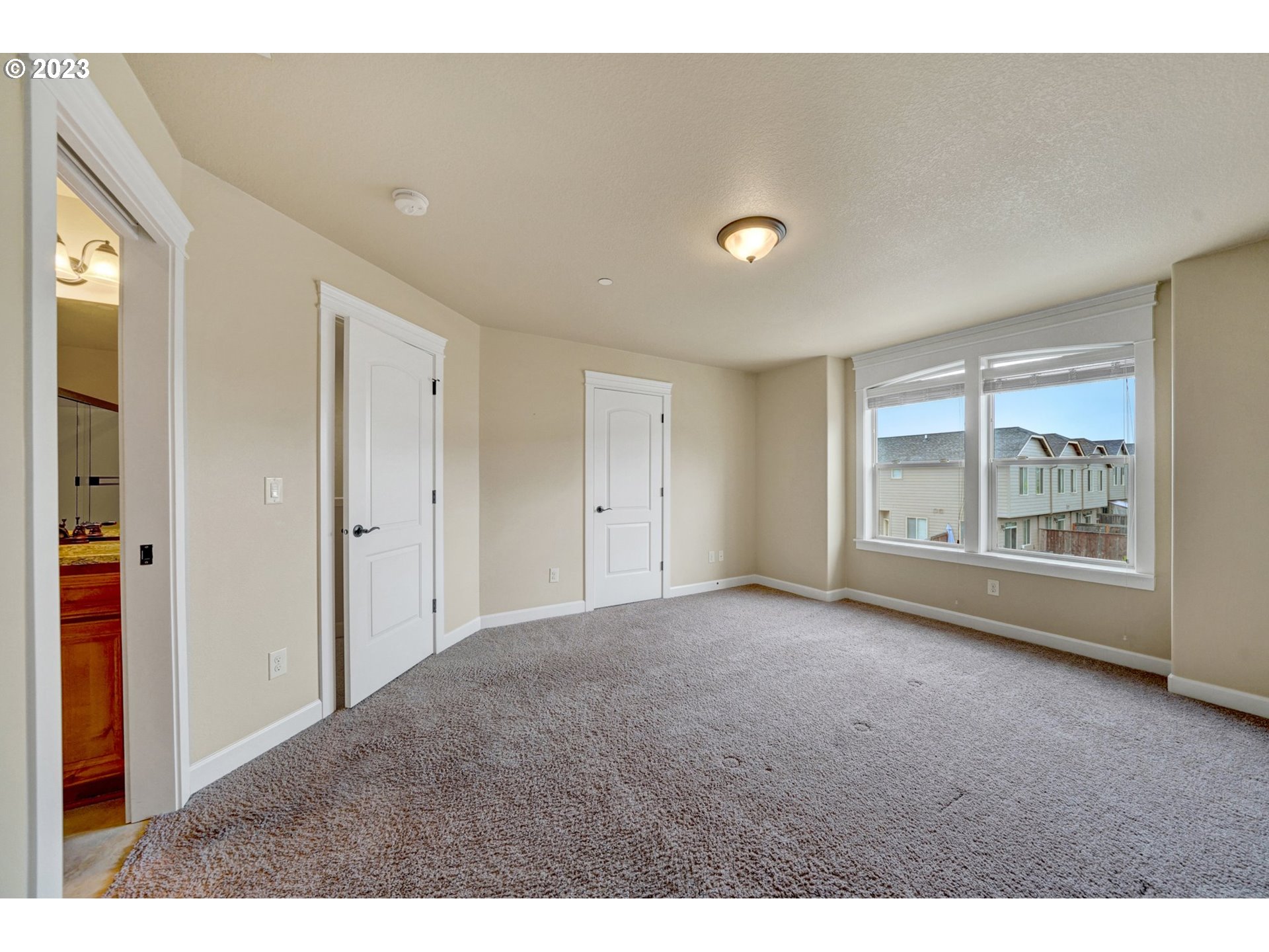 235 North 33rd Court Ridgefield, WA 98642 - Photo 14 of 30 a view of an empty room with a window