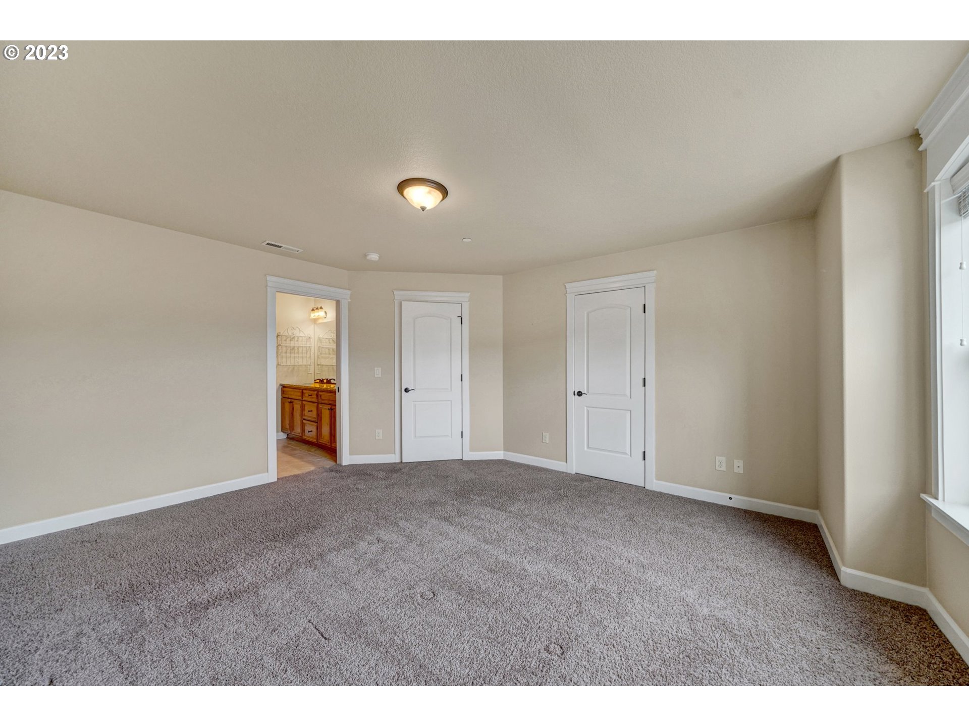 235 North 33rd Court Ridgefield, WA 98642 - Photo 15 of 30 a view of an empty room and window