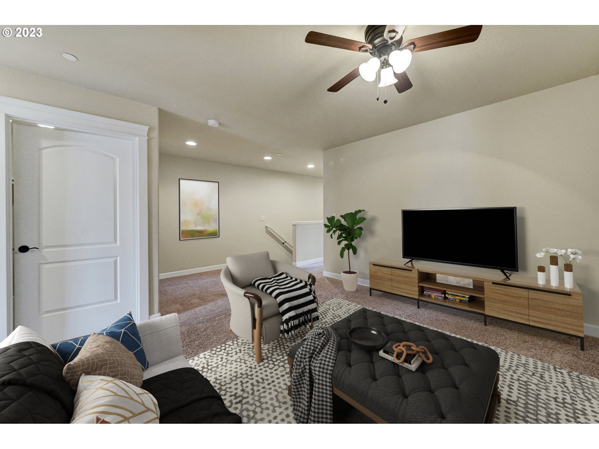 235 North 33rd Court Ridgefield, WA 98642 - Photo 19 of 30 a living room with furniture and a flat screen tv