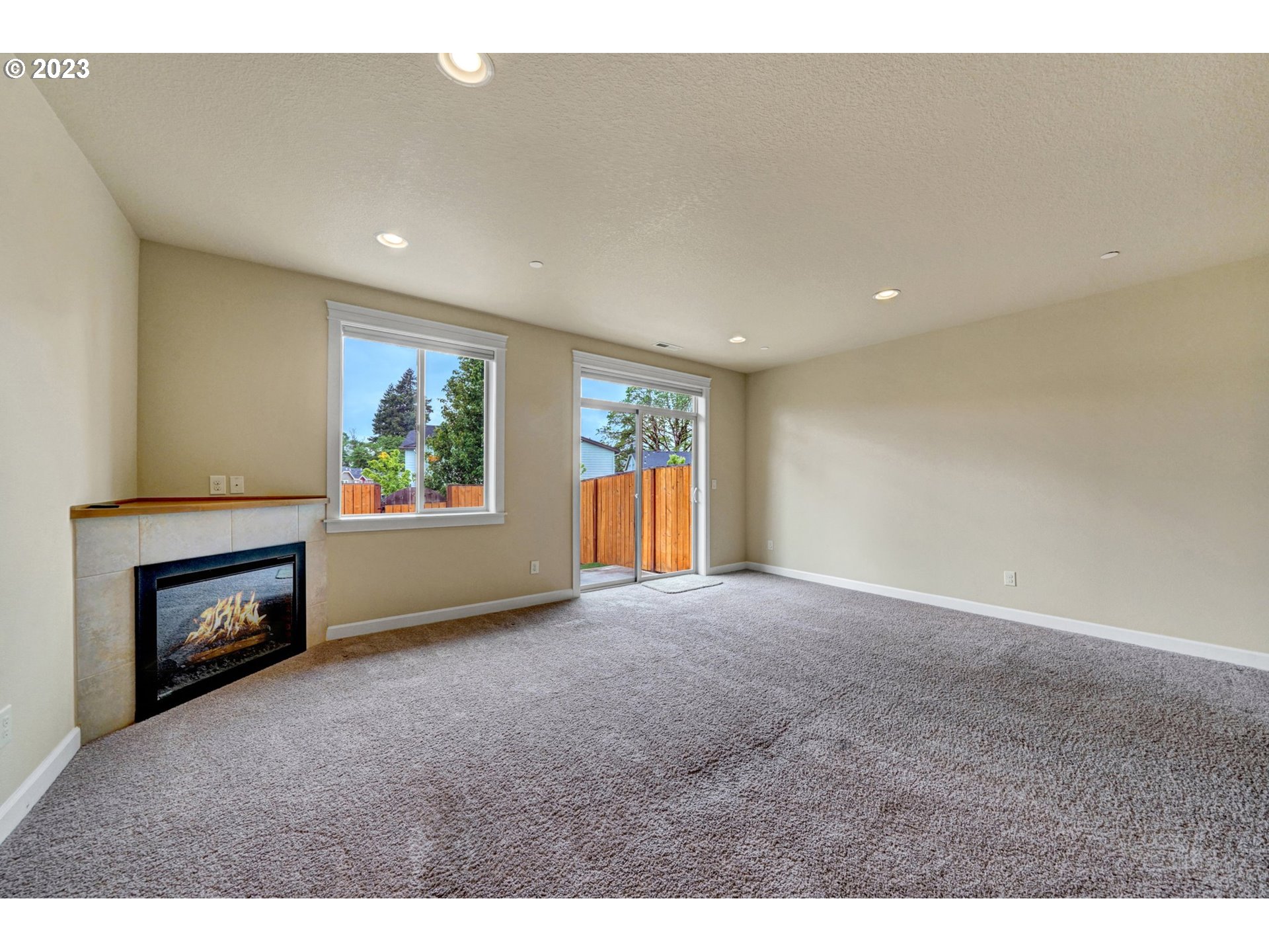 235 North 33rd Court Ridgefield, WA 98642 - Photo 7 of 30 a view of empty room with a fireplace