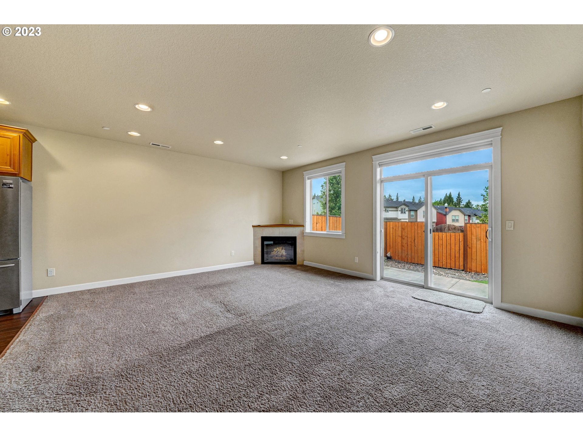 235 North 33rd Court Ridgefield, WA 98642 - Photo 9 of 30 a view of an empty room with a window
