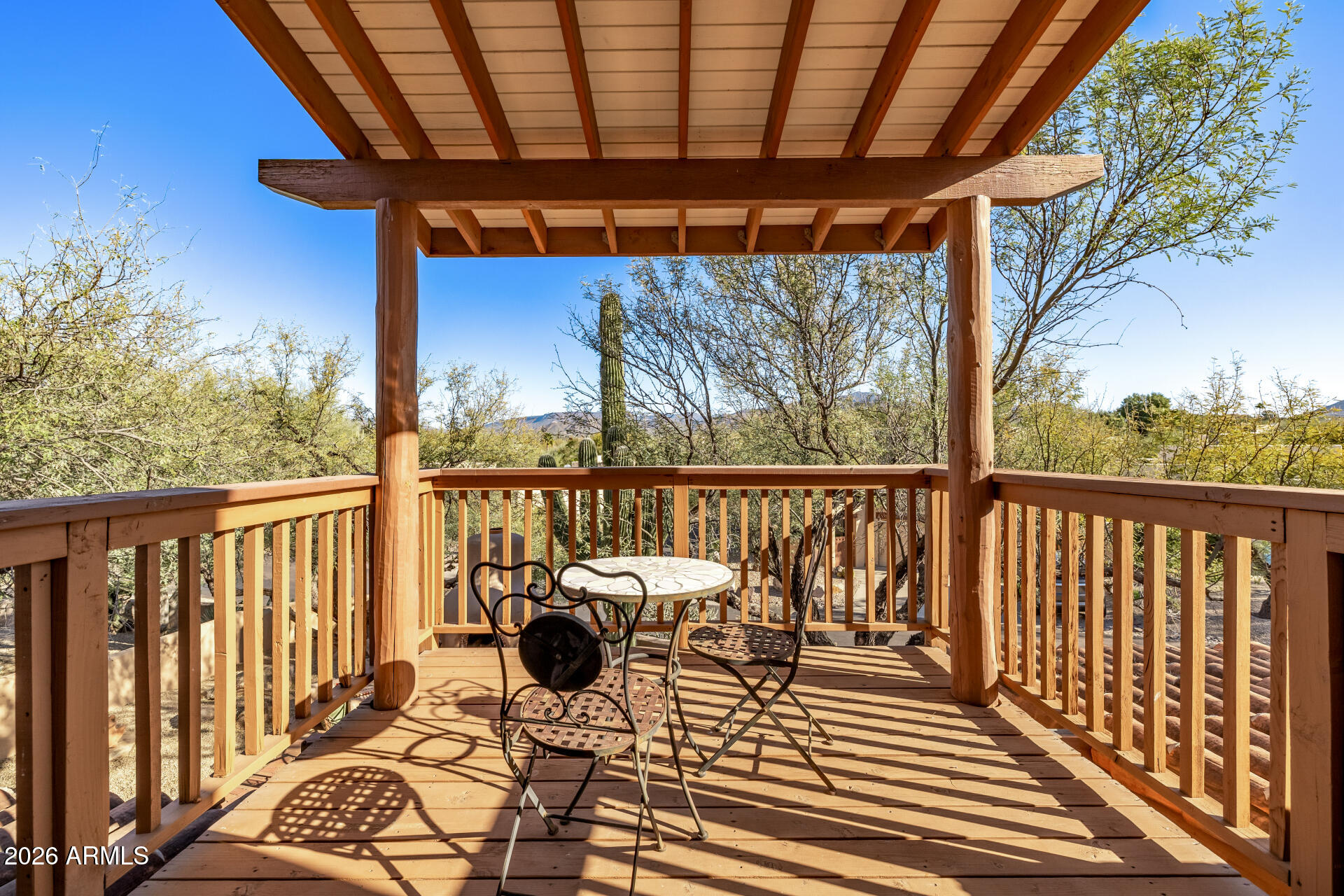 38065 North Cave Creek Road, Unit 6 Cave Creek, AZ 85331 - Photo 28 of 34 a view of balcony with wooden floor