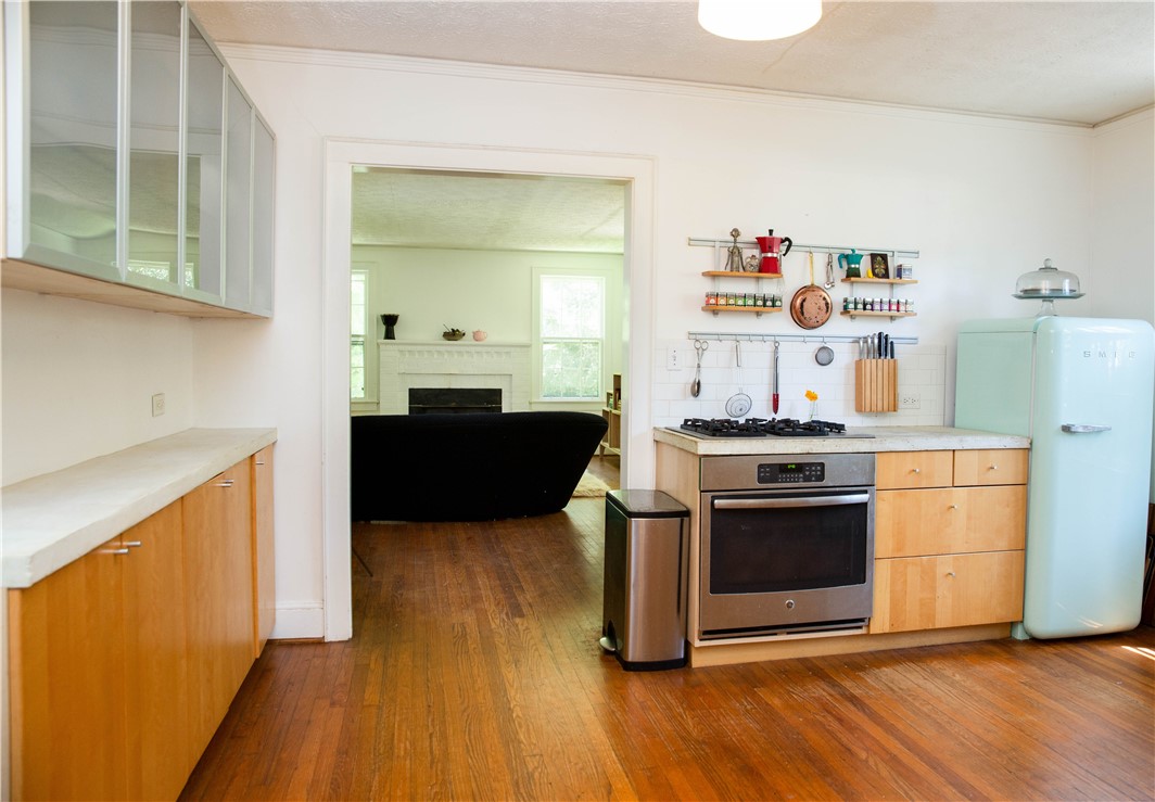 272 Riggs Drive Clemson, SC 29631 - Photo 17 of 41 Modern kitchen with concrete countertops, wood cab