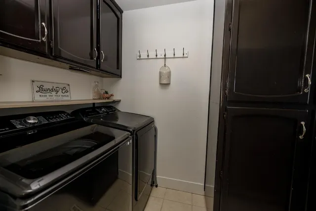 a close view of a stove and cabinets