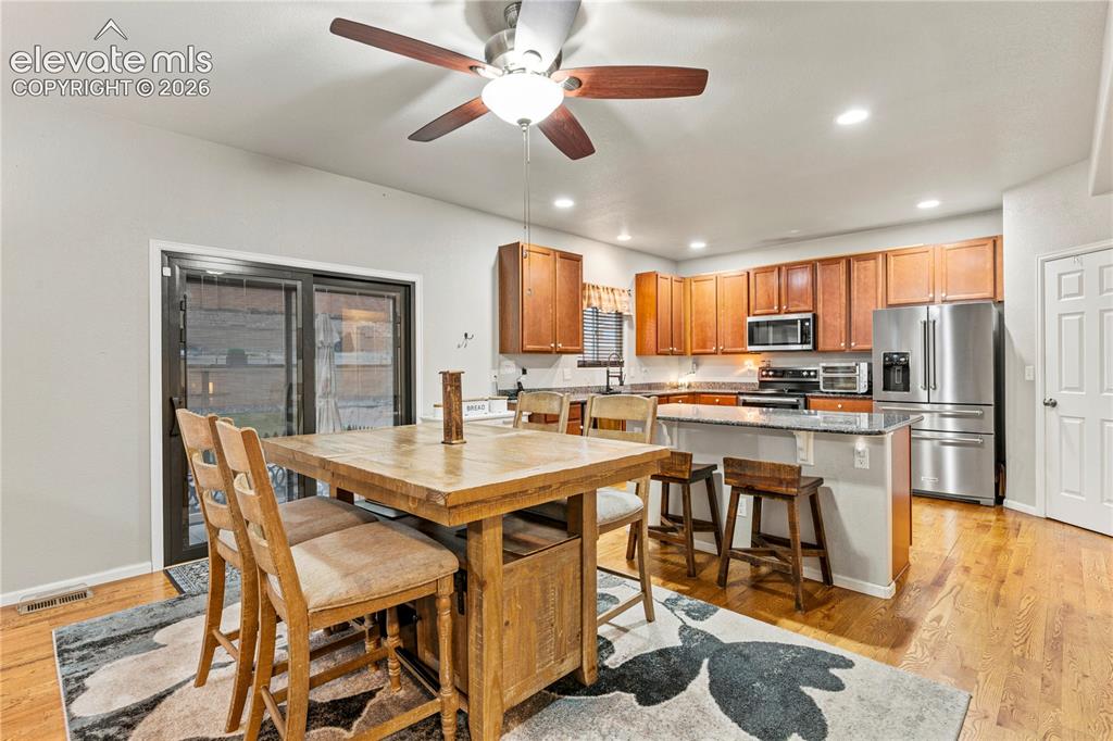 9761 Terrain Road Fountain, CO 80817 - Photo 7 of 31 Dining area walks out to back yard
