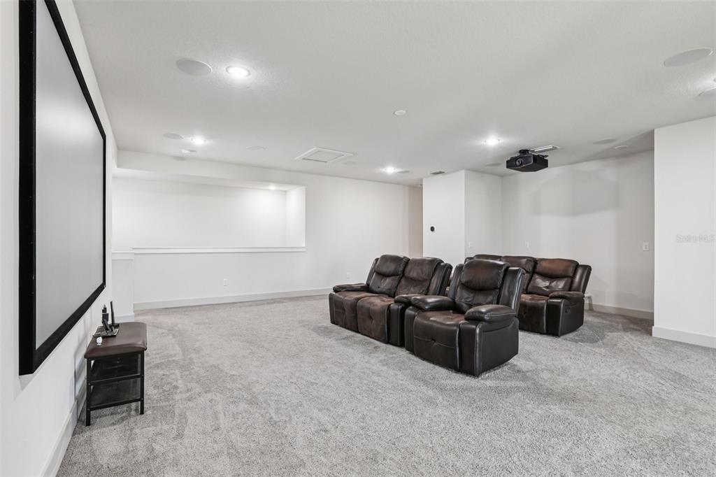 8743 Sanders Tree Loop Wesley Chapel, FL 33545 - Photo 24 of 41 a living room with furniture