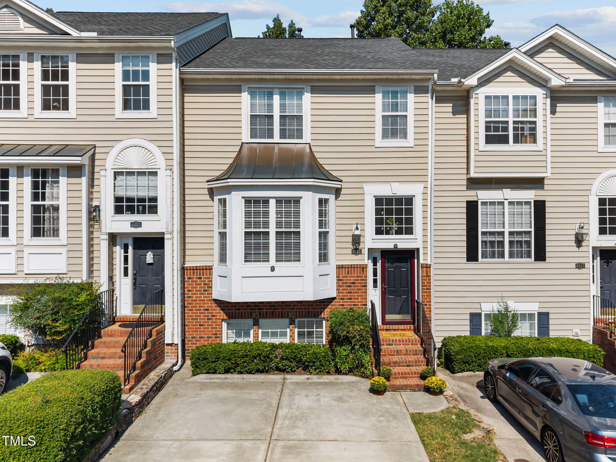 6825 Middleboro Drive Raleigh, NC 27612 - Photo 1 of 38 a front view of a house with a yard