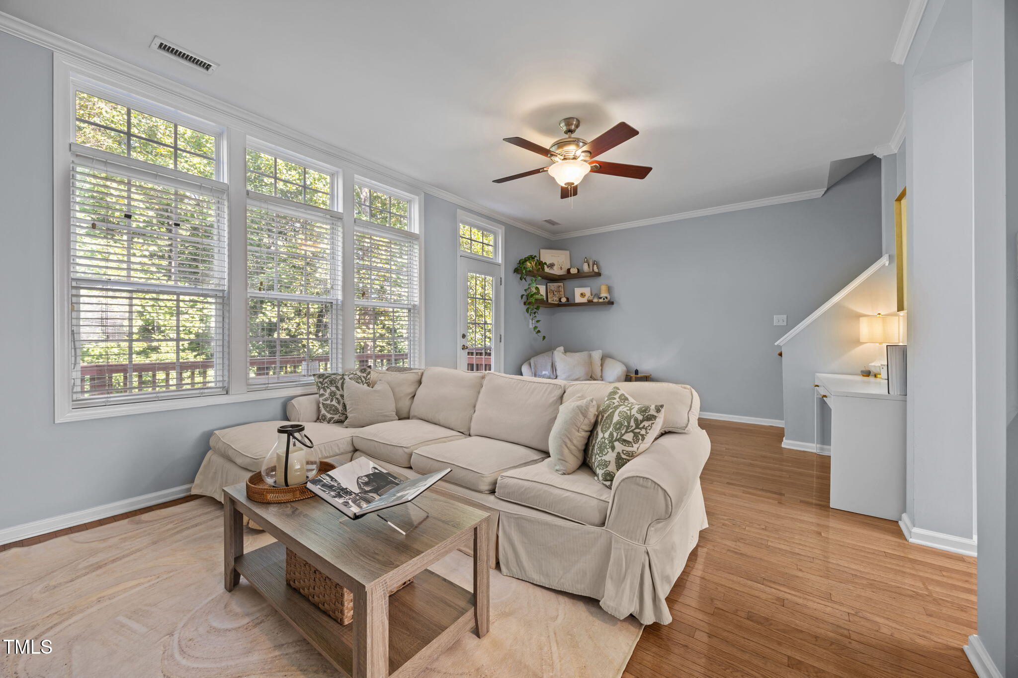 6825 Middleboro Drive Raleigh, NC 27612 - Photo 14 of 38 a living room with furniture and a large window