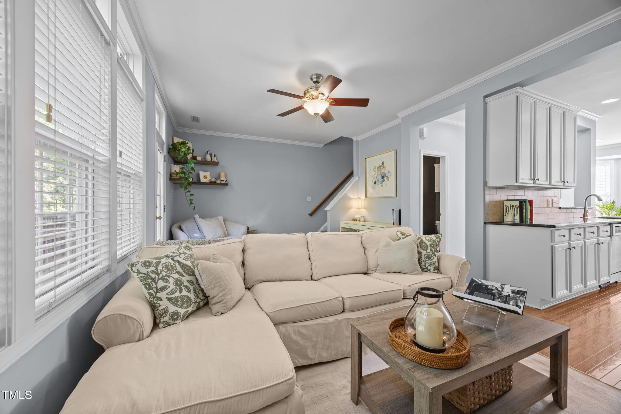 6825 Middleboro Drive Raleigh, NC 27612 - Photo 17 of 38 a living room with furniture and a large window