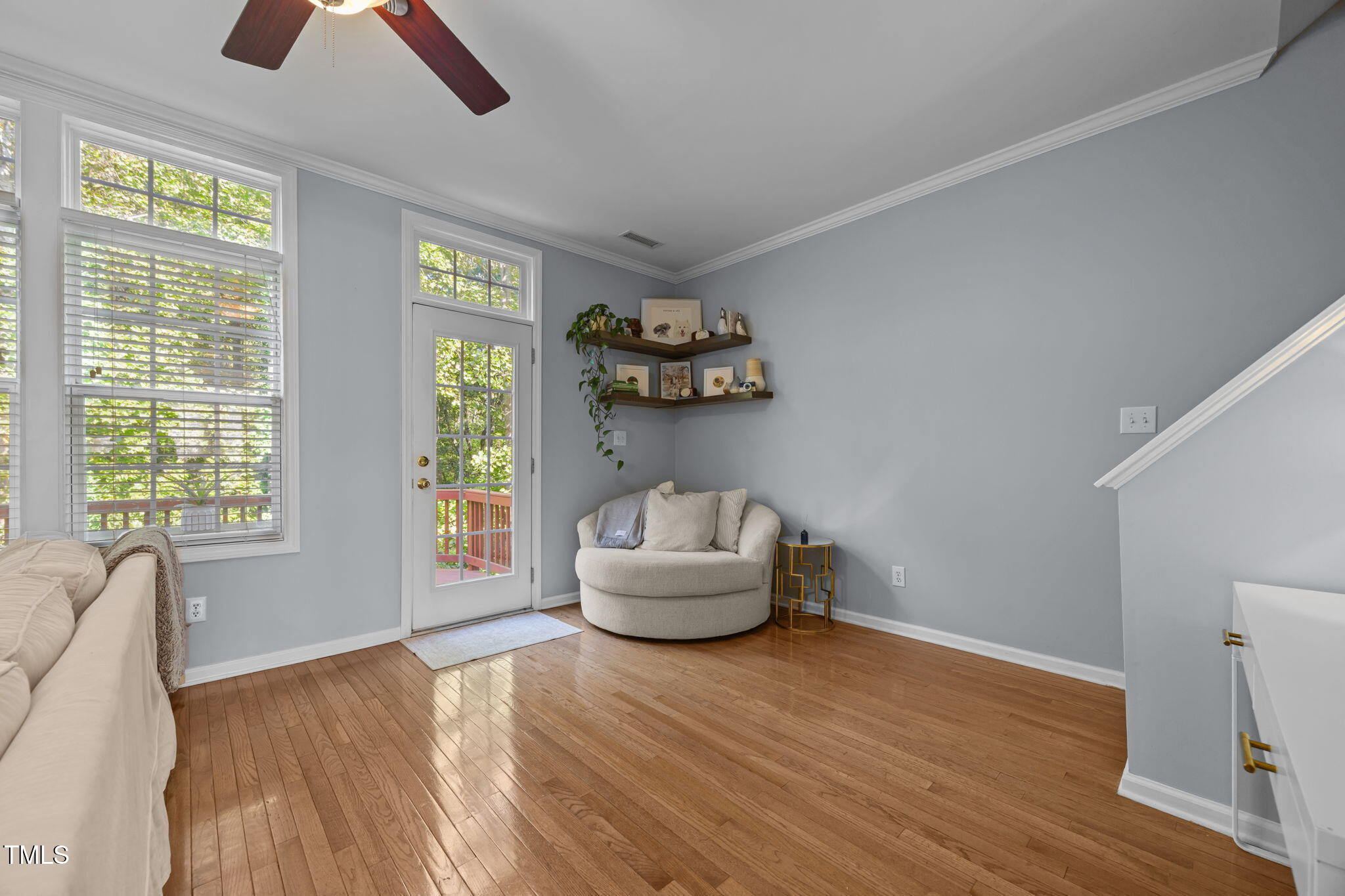 6825 Middleboro Drive Raleigh, NC 27612 - Photo 18 of 38 a living room with furniture and a large window