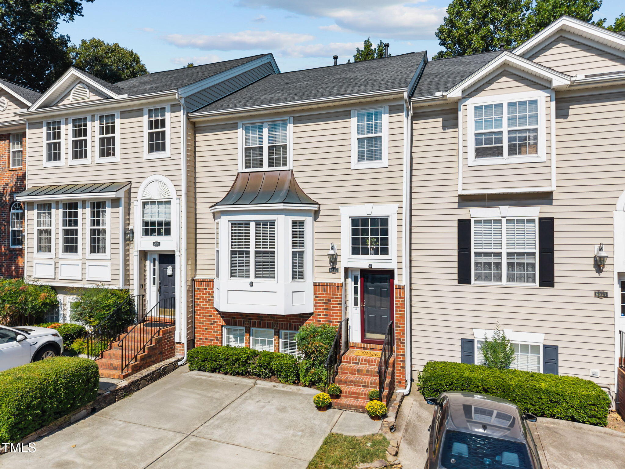 6825 Middleboro Drive Raleigh, NC 27612 - Photo 2 of 38 a front view of a house with a yard