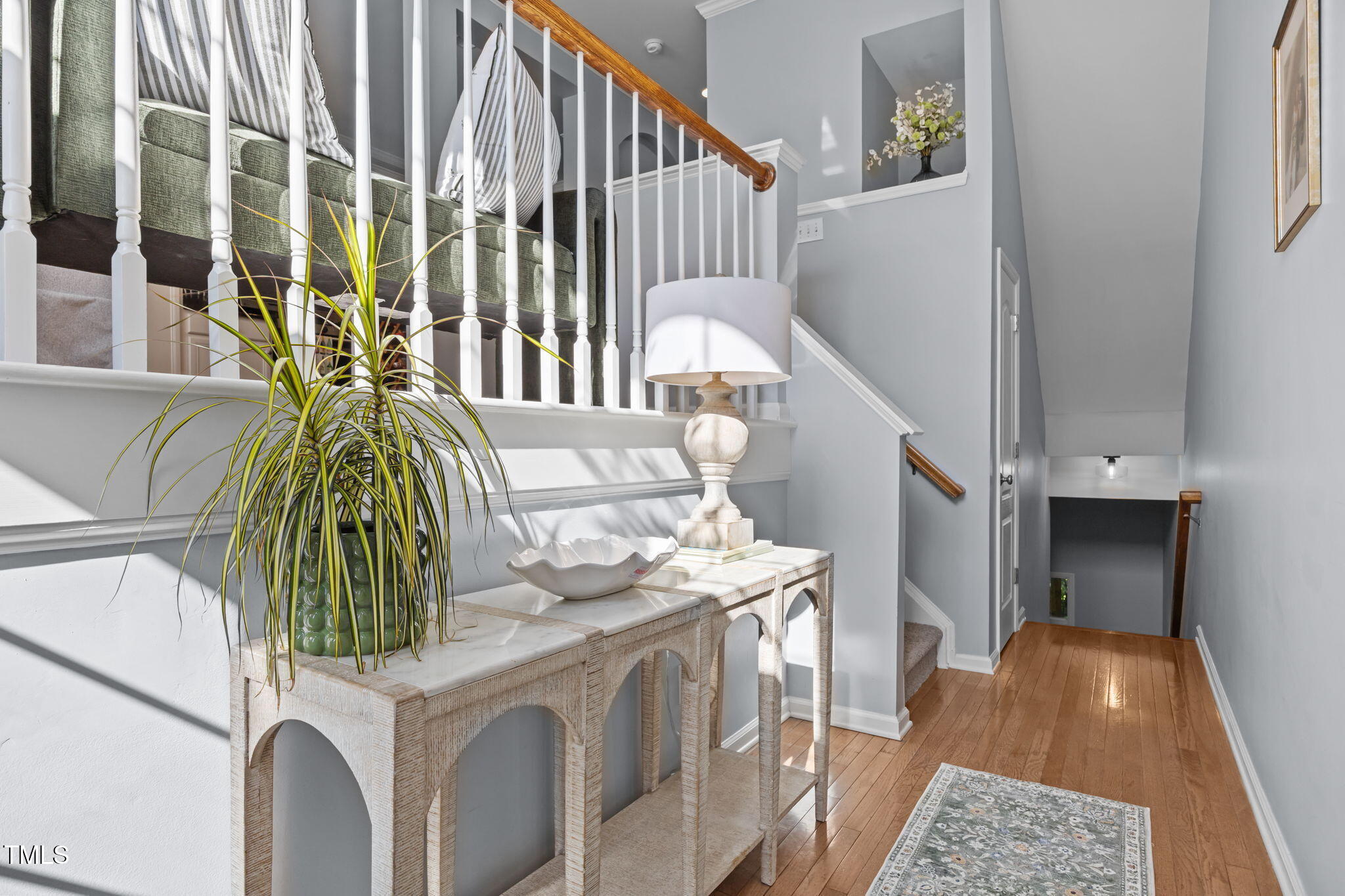 6825 Middleboro Drive Raleigh, NC 27612 - Photo 5 of 38 a vase of flowers sitting on a floor