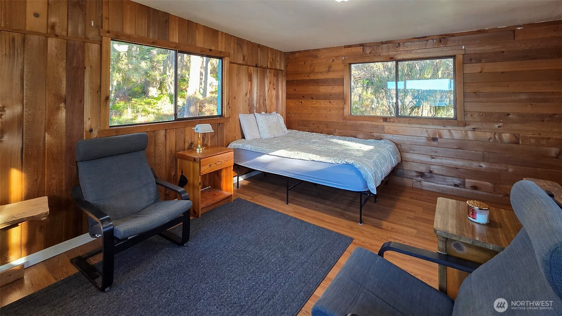 24 Starboard Road Lopez Island, WA 98261 - Photo 18 of 23 a bedroom with a bed chair and window