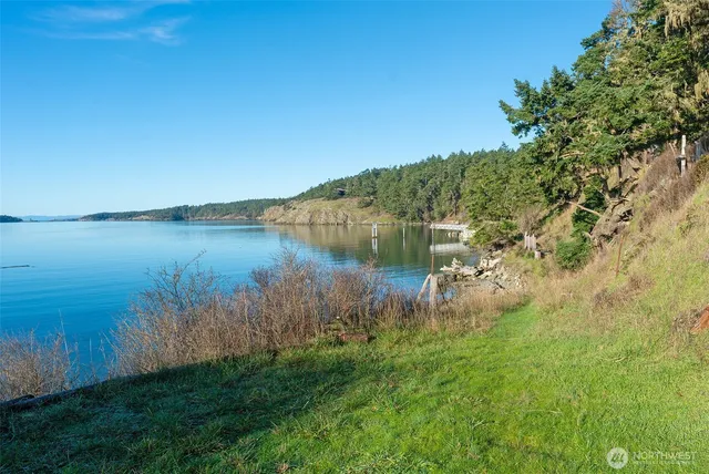 a view of a lake with a yard