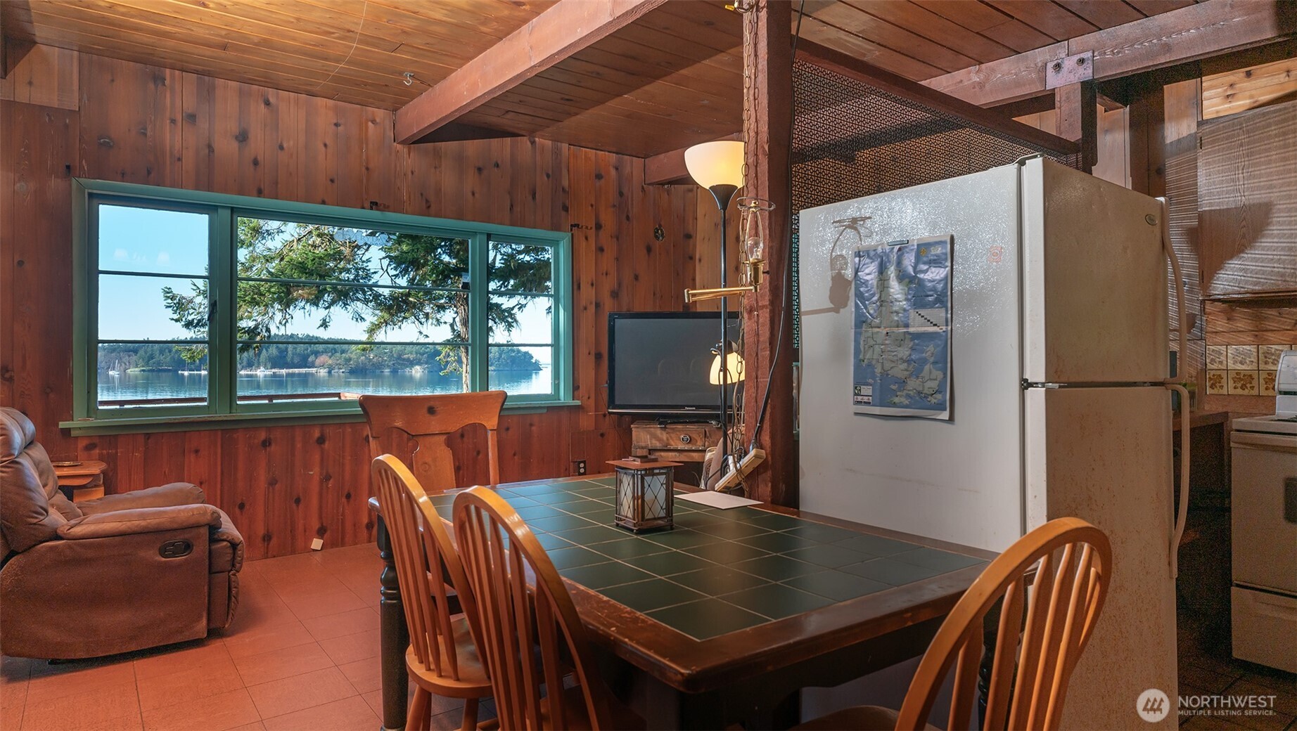 24 Starboard Road Lopez Island, WA 98261 - Photo 9 of 23 a view of a dining room with furniture window and outside view