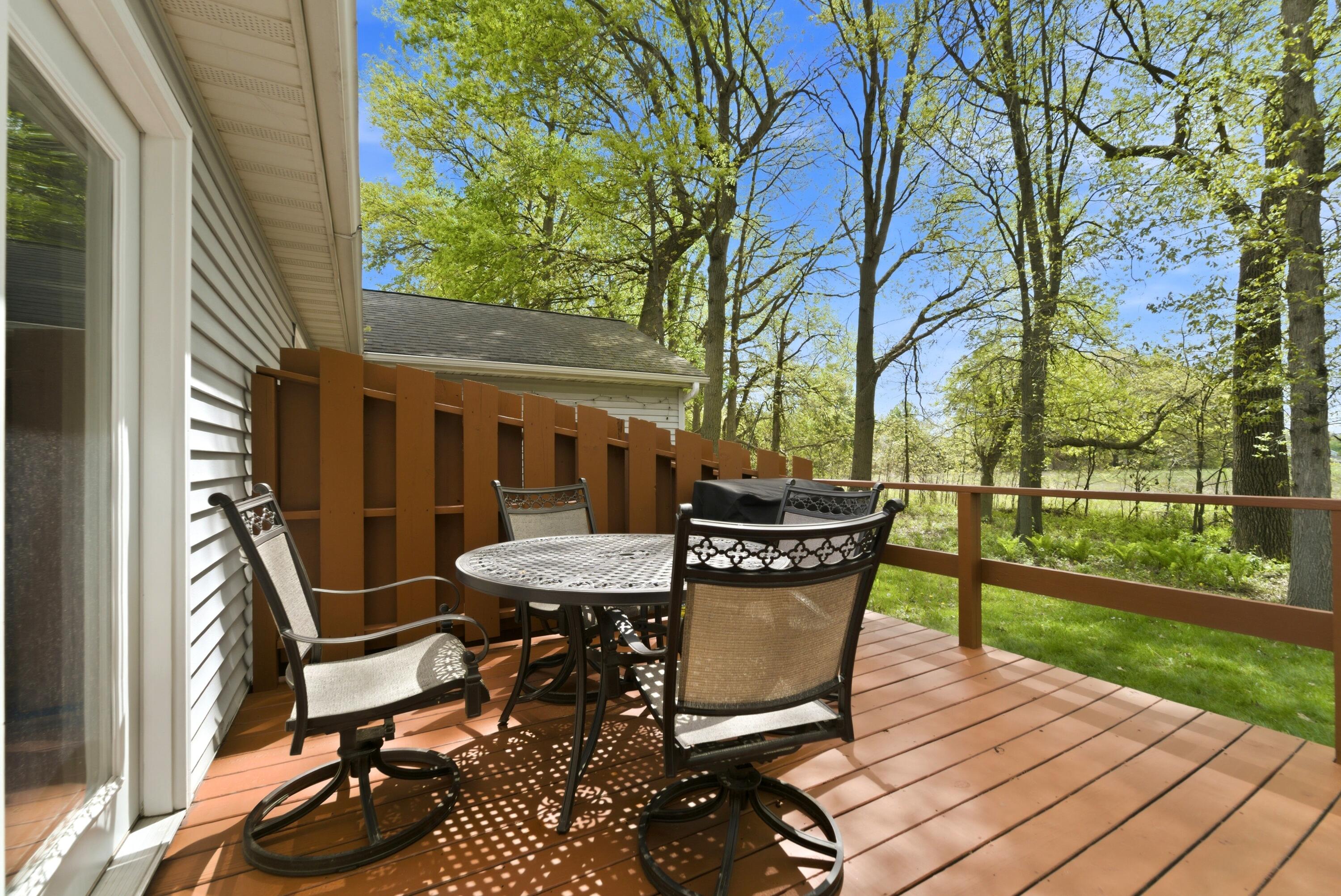2037 Texas Street Chesterton, IN 46304 - Photo 25 of 26 a patio with table and chairs and potted plants