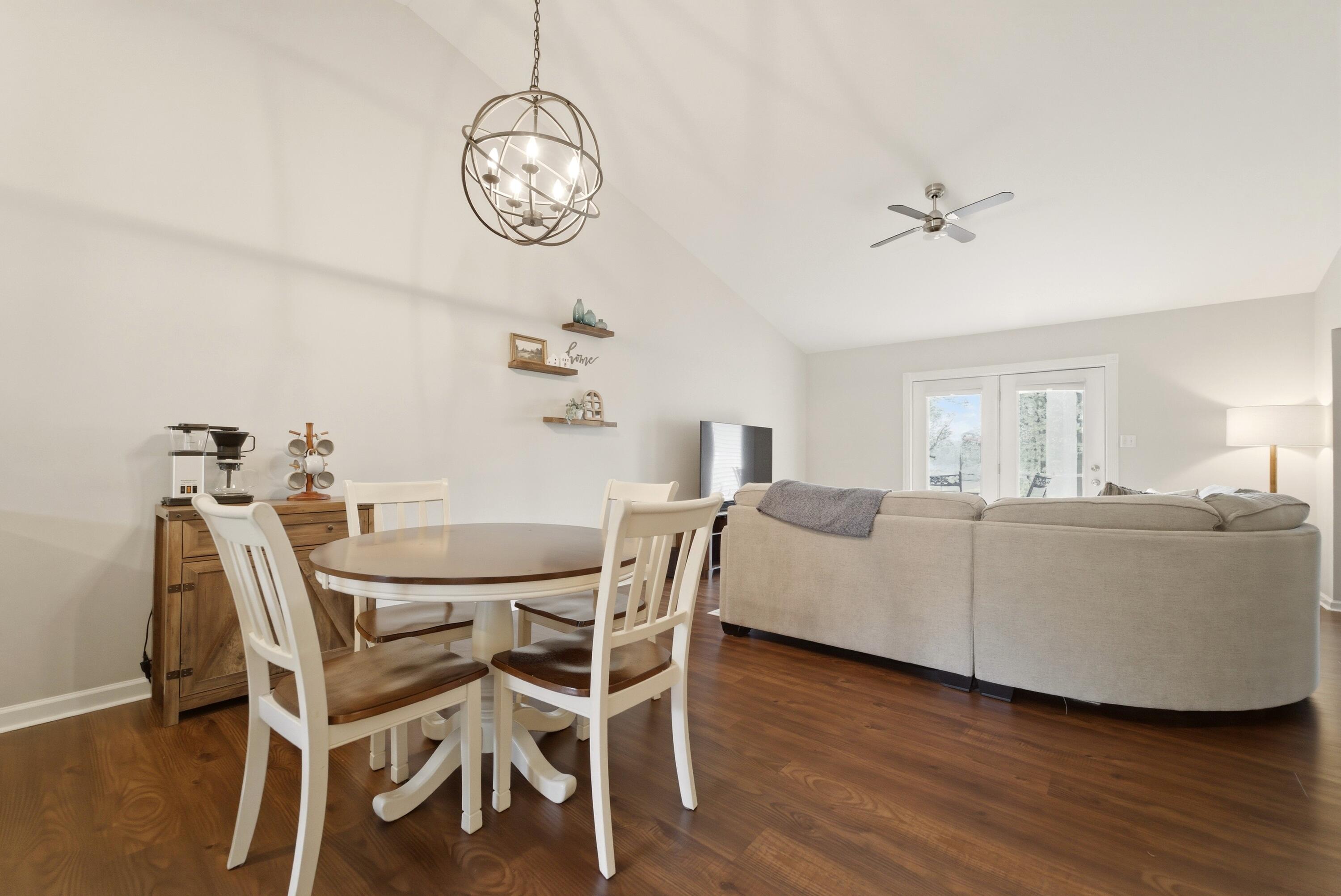 2037 Texas Street Chesterton, IN 46304 - Photo 6 of 26 a view of a dining room with furniture a chandelier and wooden floor
