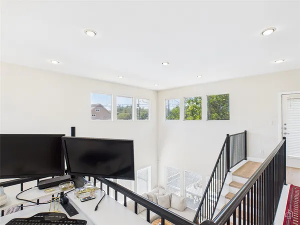 a view of a living room and a flat screen tv