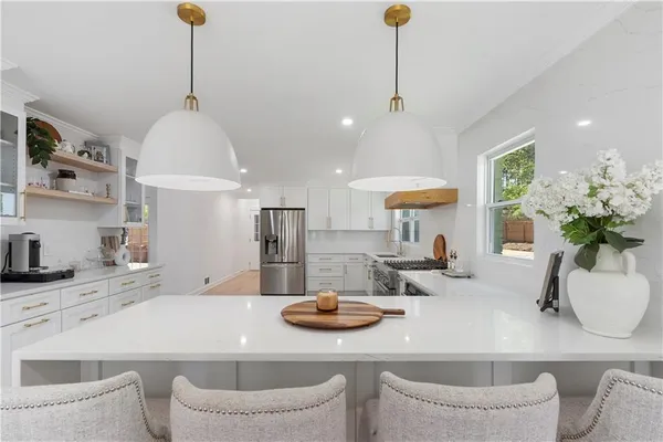$875,000 | 403 Rockbridge Road Southwest, Lilburn, GA 30047