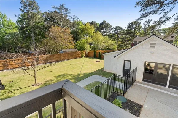 $875,000 | 403 Rockbridge Road Southwest, Lilburn, GA 30047