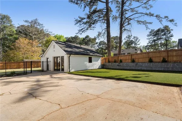 $875,000 | 403 Rockbridge Road Southwest, Lilburn, GA 30047