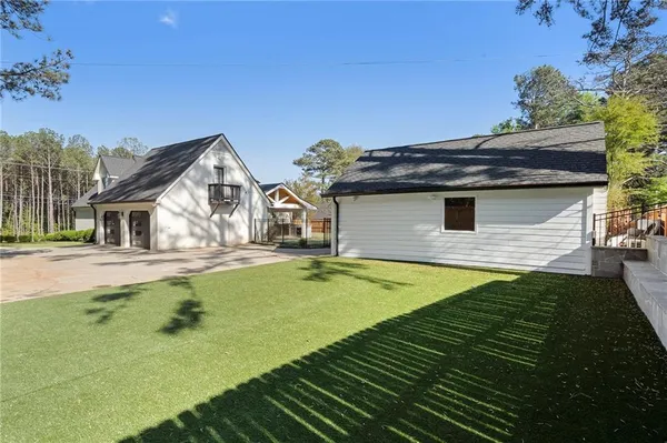 $875,000 | 403 Rockbridge Road Southwest, Lilburn, GA 30047